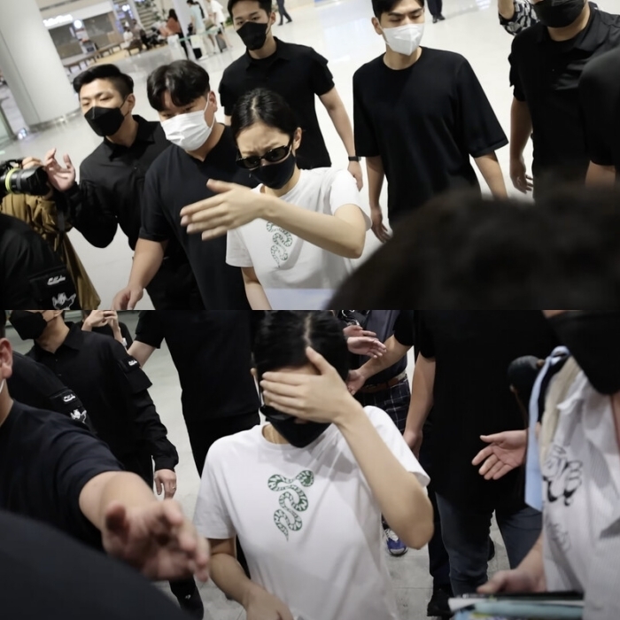 Nữ thần tượng đối diện với đám đông trong tình trang an ninh lỏng lẻo. (Ảnh: Koreaboo)
