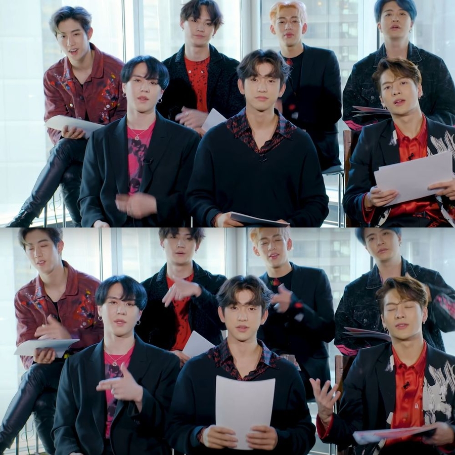 GOT7 kết hợp khẩu hiệu cùng động tác tay là hình số 7. (Ảnh: Chụp màn hình YouTube Billboard)